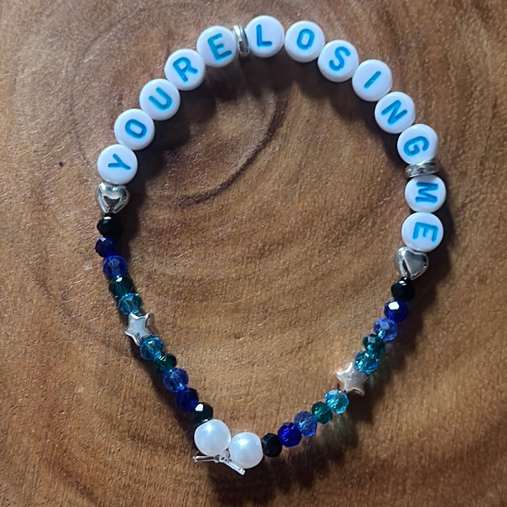 5 for $20 Taylor Swift Handmade Friendship Beaded Bracelet
“You’re Losing Me”